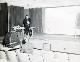 Demonstration for Student Unions 1959: Student Speaking on Right Side of Stage