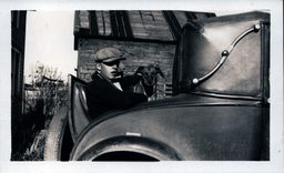 Young Tom Ross in Car Trunk with Dog