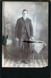 Young Man with Small Table