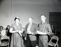 Parents Day 1958: Student Standing with Parents