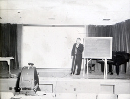 Demonstration for Student Unions 1959: Student Speaking in Front of Chalkboard