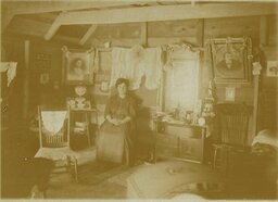 Strickland Woman in Home