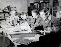 Peninsulan--Staff 1950: Photo of the Staff of the Peninsulan Working on Publication