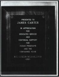 Plaque to James L. Carter, 1980