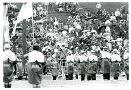 Marching Band Performing in Rain on Football Game (Part of the NMU Historic Photographs Collection)