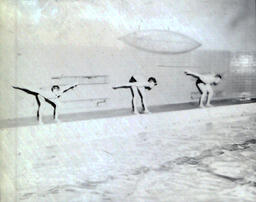 NMC Swimming Team 1961: Three Men About to Jump into Swimming Pool