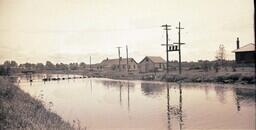 (004-001) Landscape with river and houses