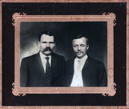 Mounted Portrait of Two Men in Suits