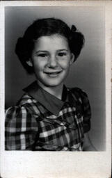 Portrait of Girl in Checkered Dress