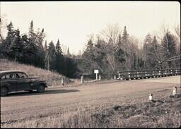 (106-012) Car Approaching Bridge