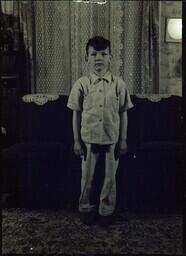 (048-006) Chabot Boy Standing in Front of Couch (2 of 2)