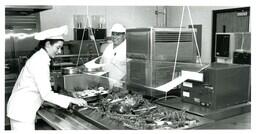 Kitchen Staff Preparing a Salad Bar (Part of the NMU Historic Photographs Collection)