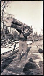 Man Hauling Logs, 2 of 2