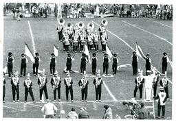 Marching Band Performing in Lines on Football Field (Part of the NMU Historic Photographs Collection)