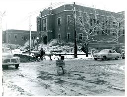 Driver’s Training Cars Outside Graveraet High School Instructor Teaching Students about Engine (Part of the NMU Historic Photographs Collection)