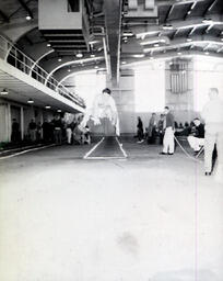 Track--Northern vs. Wayne 1960: Long Jumper Mid-Jump