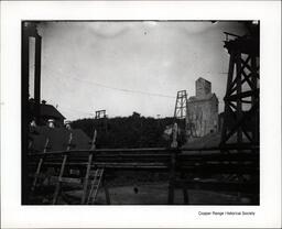 Wooden Scaffolding or Fence in front of Unknown Copper Range Company Mine Shafthouse