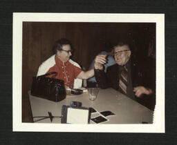 Man and Woman at Restaurant Table