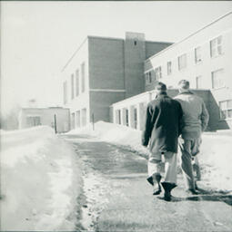 Former Campus Scenes: Two Men Walking in Winter