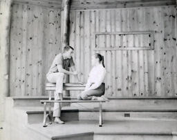 Masquers--"The Rainmaker" 1959: Man and Woman Sitting on Bench on Stage