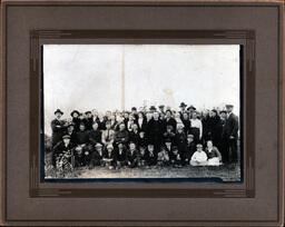 Large Group Photo with Four Soldiers