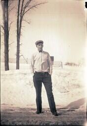 (132-014) Young Man Posing in Snow