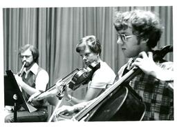 Closeup of Cello, Violin, and French Horn Players (Part of the NMU Historic Photographs Collection)