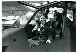 Woman Smiling while Sitting in Helicopter (Part of the NMU Historic Photographs Collection)