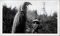 Young Tom Ross and Woman with Farm Tool