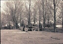 (106-009) Car Sitting in Mud