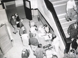 Interior Dorm and Kaye Hall Pictures 1955: Lobby/Stairs of Kaye Hall With "Thursday is Cold Day" Sign