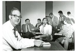 Professor and Students Looking Directly at Camera (Part of the NMU Historic Photographs Collection)