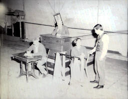 NMU Masquer's--"Night of January Sixteenth" March 1961: Four People Standing Near Each Other on Stage