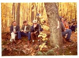 Group of People Sitting in Woods (Part of the NMU Historic Photographs Collection)