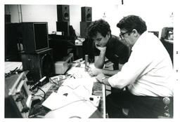 Student and Professor Working on Electronic Equipment (Part of the NMU Historic Photographs Collection)