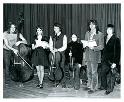 Group of String Players Posing with Instruments and Sheet Music (Part of the NMU Historic Photographs Collection)