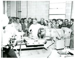 Class Watching Professor Demonstrate Machine (Part of the NMU Historic Photographs Collection)