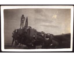 Man (Clarence Fabry?) on Top of Plane