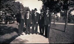 (016-010) Five Men Posing on Sidewalk