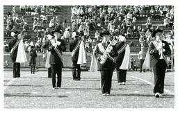 Marching Band Members Performing at Football Game (Part of the NMU Historic Photographs Collection)