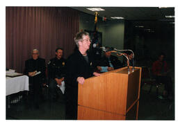 President Judith Bailey Giving Speech at Podium (Part of the NMU Historic Photographs Collection)