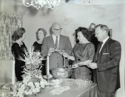 President's Reception 1960: Photo of Three Women and One Man Speaking With President