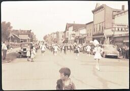 (050-004) Marching Band Performing next to Shamrock Bar in Ontonagon Labor Day Parade