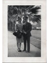 Tom and Dorotha Ross on Sidewalk with Palms