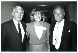 Three People Standing in a Hallway (Part of the NMU Historic Photographs Collection)