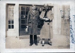 Boy and Woman in Coats