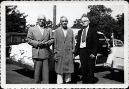 Three Men in Parking Lot