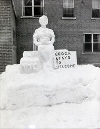 All Events Weekend 1959: Snow Sculpture with Sign That Says "G.O.O.C.H. Stays to Welcome"