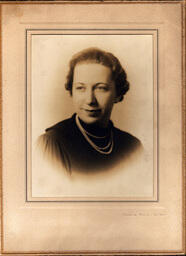 Studio Portrait of Middle-Aged Woman