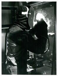 Person Welding (Part of the NMU Historic Photographs Collection)